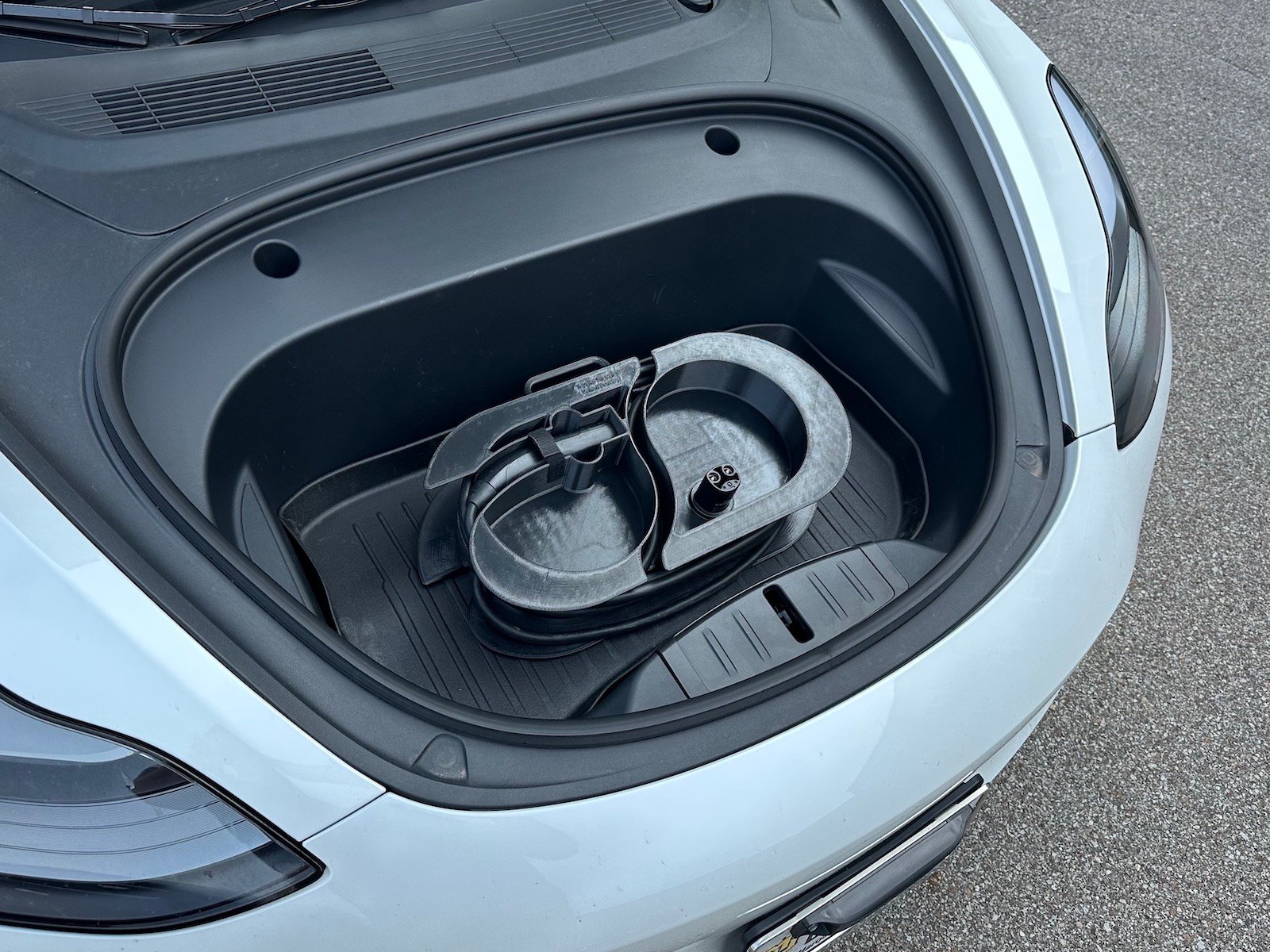 Tangler Wrangler in the front trunk of a Tesla Tangler Wrangler in the front trunk of a Tesla